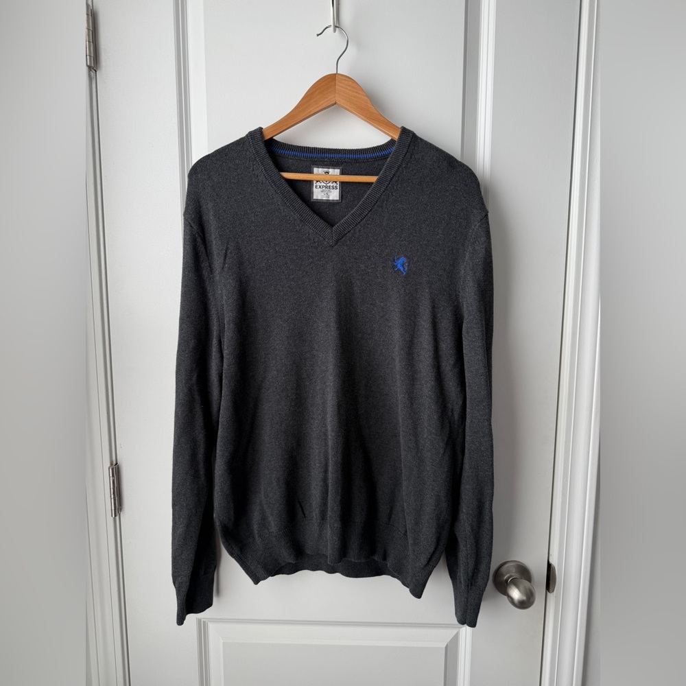 express polo crew sweater with blue embroidered lion